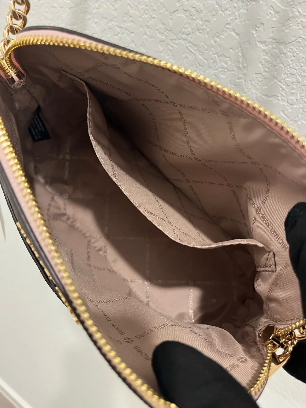 Michael Kors Brown Monogram Crossbody with Pink Trim and Gold Chain Brand new .